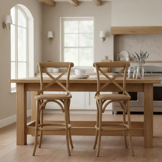 Wooden dining table with two chairs in a kitchen setting