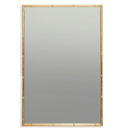 Rectangular mirror with a gold frame on a white background