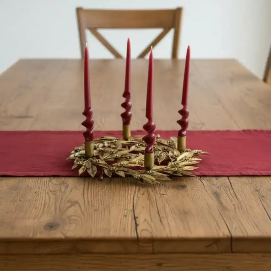 Decorative candle holder with five candles on a white background