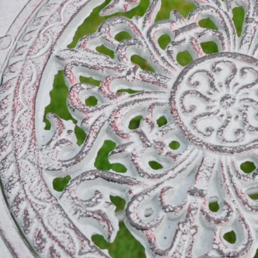 Close-up of a decorative ceramic plate with intricate patterns