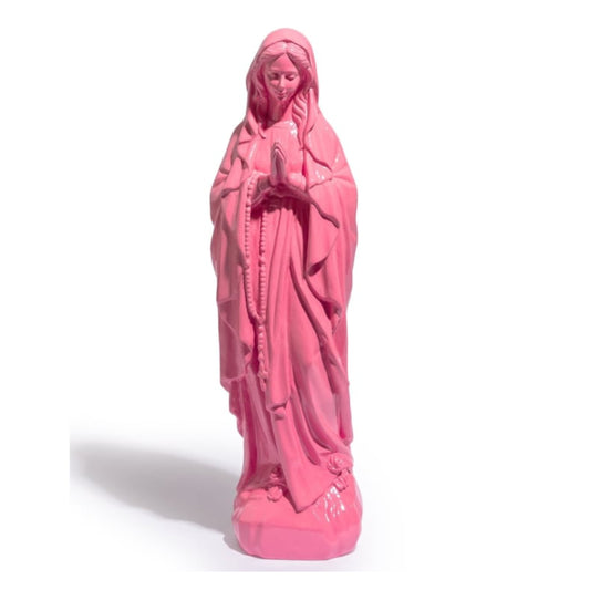 A pink religious figurine of the Virgin Mary, depicted in a prayer pose with rosary in hand, on a white background.
