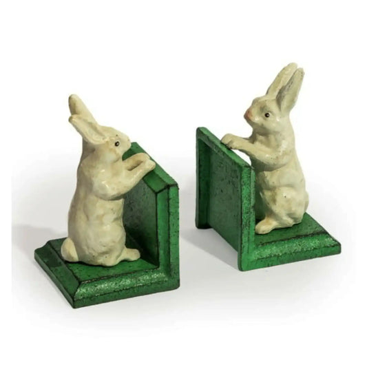 Two rabbit-shaped bookends on a white background