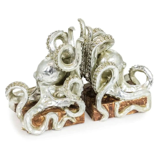 Decorative silver octopus sculpture on a wooden base