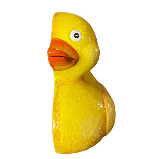 A classic yellow rubber duck toy with a glossy finish, featuring a bright orange beak and a detailed white eye with a black pupil, isolated on a solid white background.