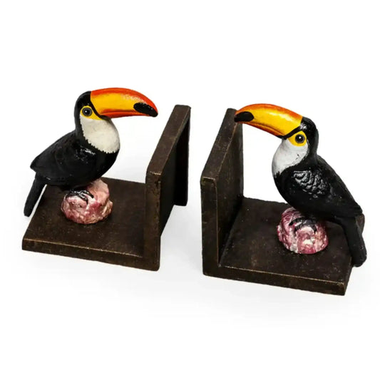 Two toucan bookends on a white background