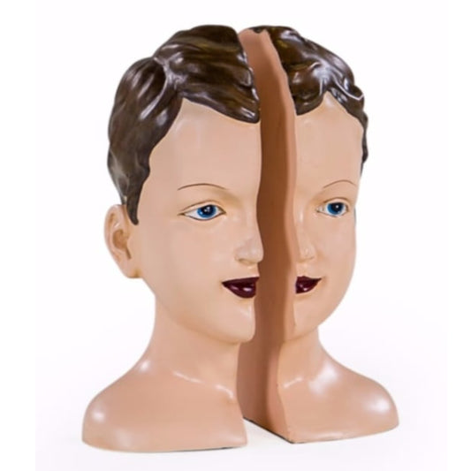 Mannequin head with split face for hairdressing training on a white background
