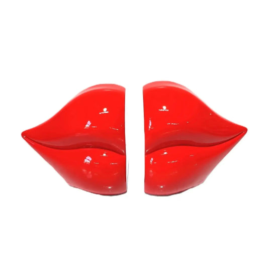 Red lip-shaped objects on a white background