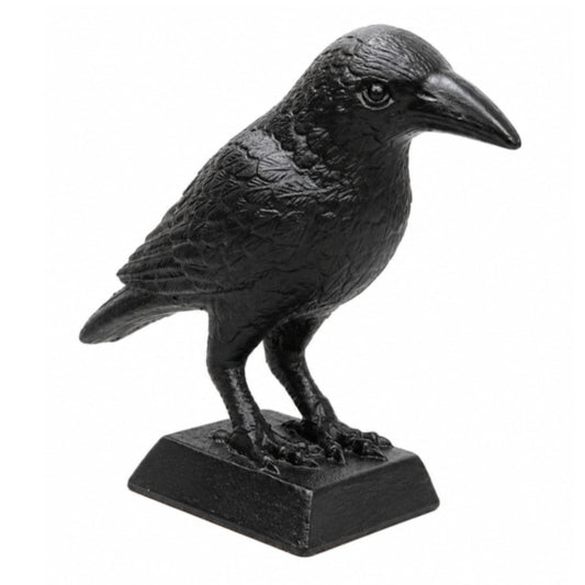 Black crow figurine on a white background
