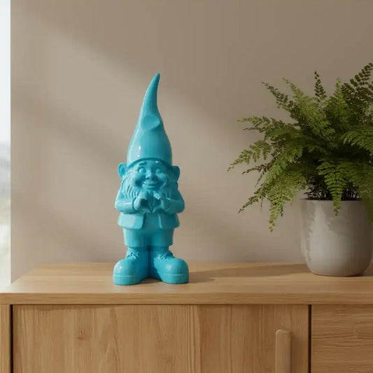 Blue gnome figurine on a white background