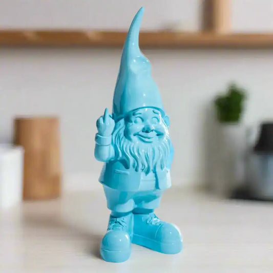 Blue gnome figurine with a pointed hat on a white background