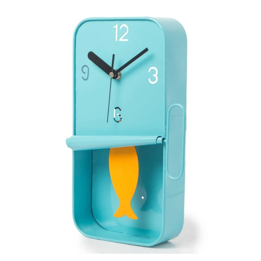 Blue clock with a yellow fish design on a white background