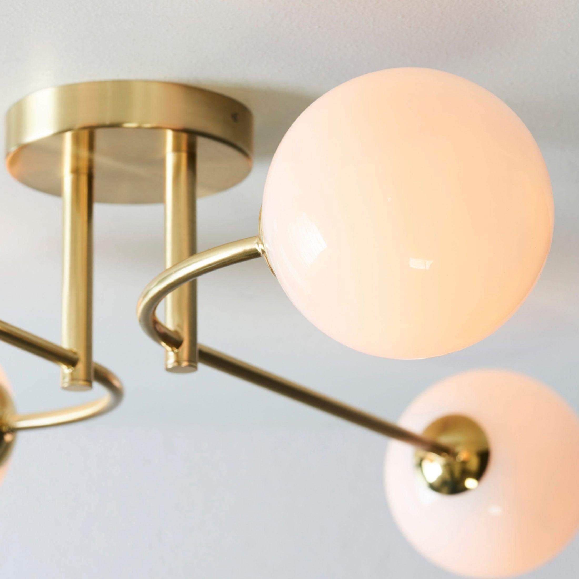 Brushed Brass Art Deco Inspired Four Globe Ceiling Light