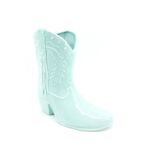 Mint green cowboy boot on a white background