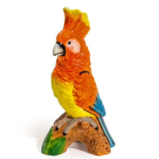 Colorful parrot figurine on a white background