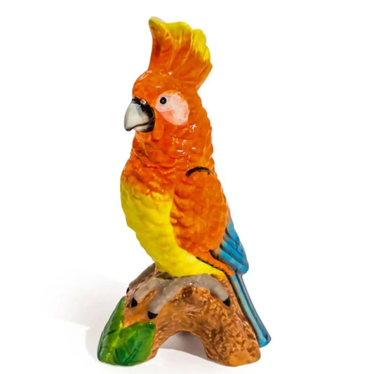 Colorful parrot figurine on a white background