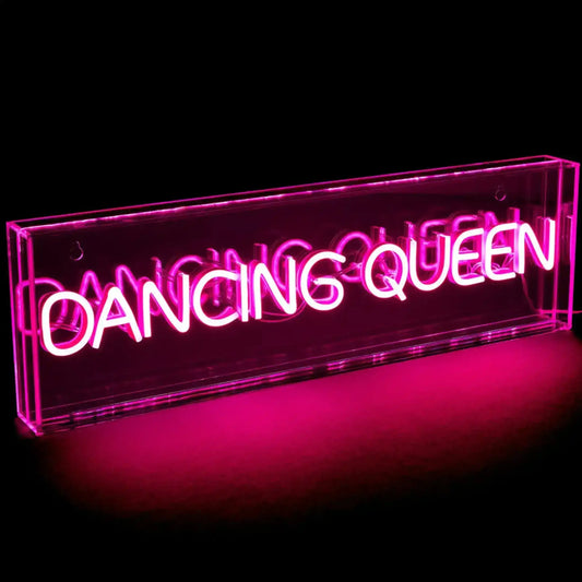 Neon sign with 'Dancing Queen' text on a black background