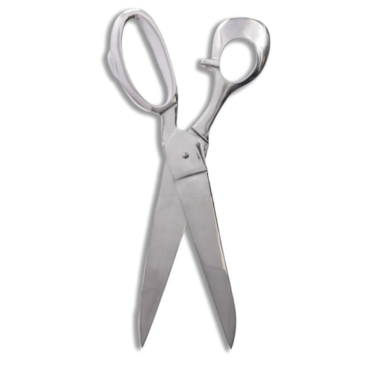 Silver scissors on a white background