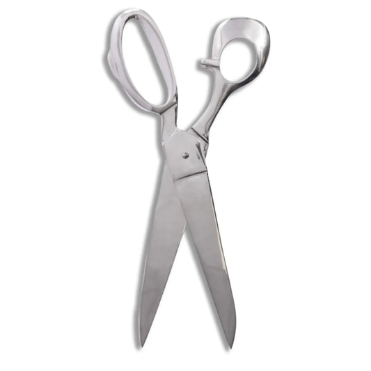 Silver scissors on a white background