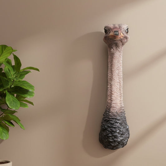 Ostrich head with a blue background