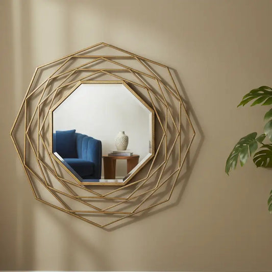 Decorative wall mirror with geometric gold frame on a beige wall