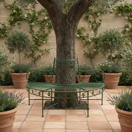 Wrought iron bench with decorative backrest on a wooden floor