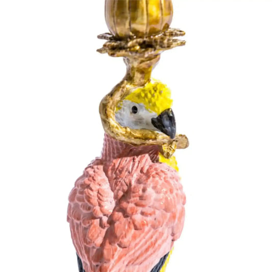 Decorative flamingo figurine with a yellow top on a white background