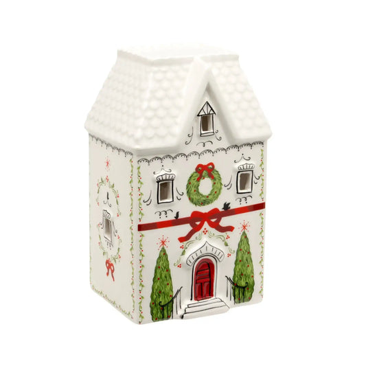 Decorative house-shaped box with Christmas elements on a white background