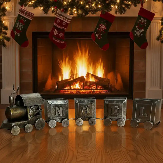 Set of toy train carriages with letter designs on a wooden floor.