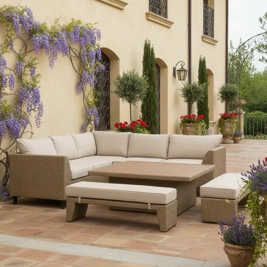 Outdoor patio furniture set with beige cushions in a garden setting.