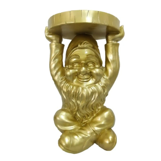 Gold gnome statue holding a round object on a white background
