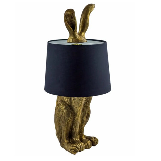 Decorative lamp with rabbit design and black lampshade on a white background