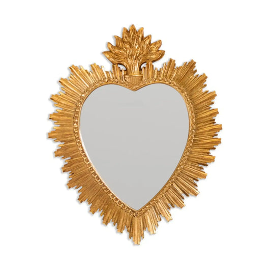 Heart-shaped mirror with gold leaf frame on a white background