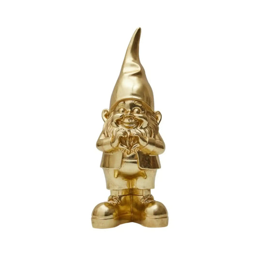 Gold gnome figurine on a white background