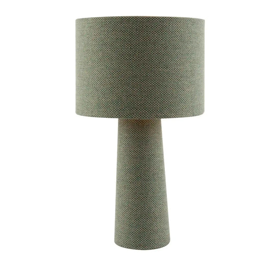 Green textured table lamp on a white background