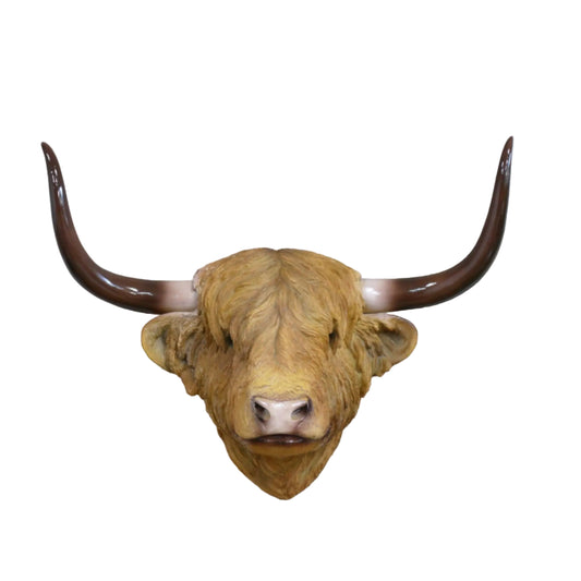 A realistic longhorn bull head wall mount with curved dark brown horns, mounted against a faux gray brick wall background.