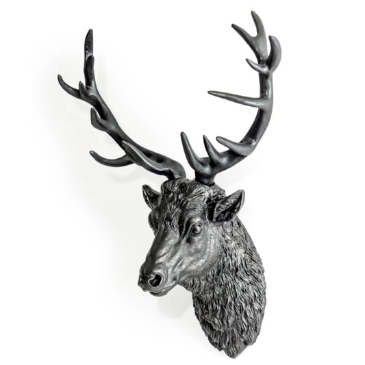 Decorative deer head with large antlers on a white background