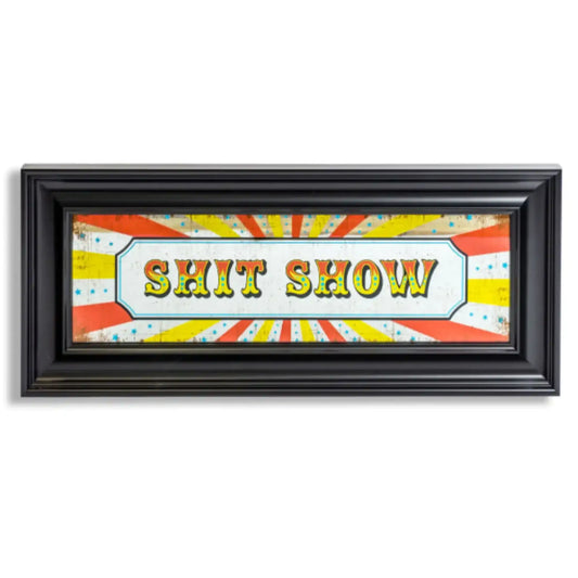 Framed artwork with colorful design and text 'SHIT SHOW' on a white background