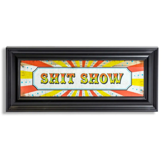 Framed artwork with colorful design and text 'SHIT SHOW' on a white background