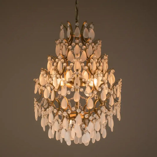 Decorative chandelier with crystal elements on a dark background
