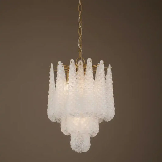 Chandelier with white glass shades on a brown background
