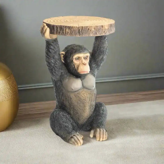 Monkey figurine holding a wooden platform on a white background