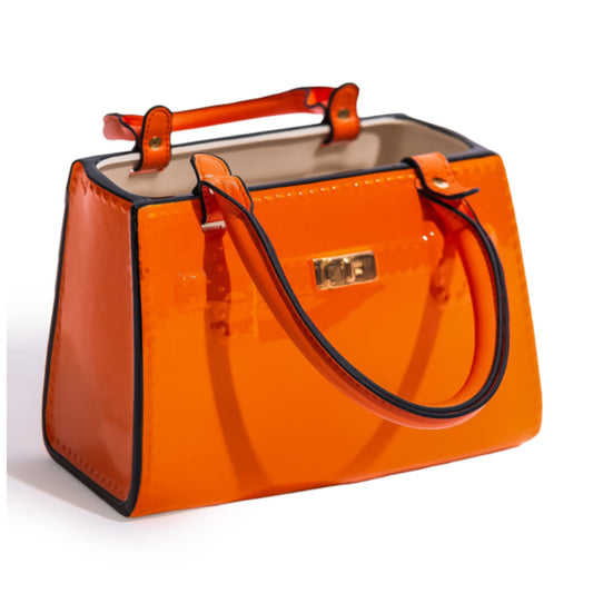 Orange handbag with black handle on a white background