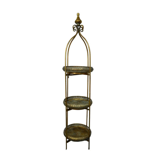 Decorative three-tiered metal stand against a plain background