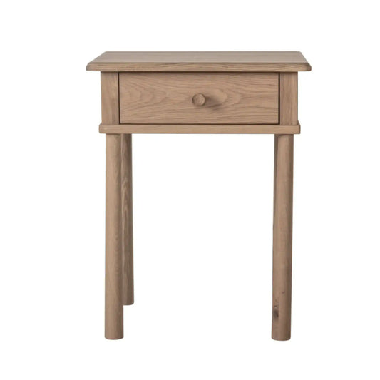 Wooden side table with a single drawer on a white background