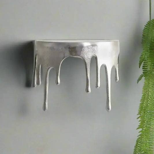 Silver ring with a unique design on a white background