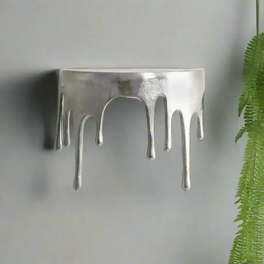 Silver ring with a unique design on a white background