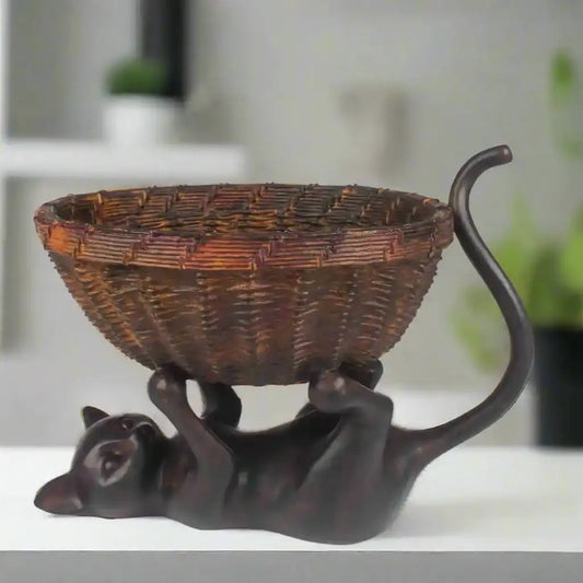 Playful kitten Holding Basket