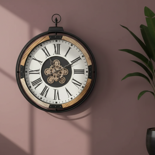 Decorative wall clock with Roman numerals on a pink wall