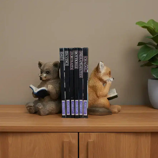Two animal figurines reading books on a wooden surface with a rustic background.