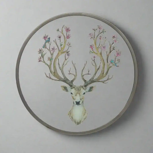 Decorative wall art with a deer head and floral antlers on a white background